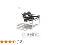 Silla icónica de diseño moderno sobre fondo blanco ártico. Un clásico que evoca la pureza y la elegancia.