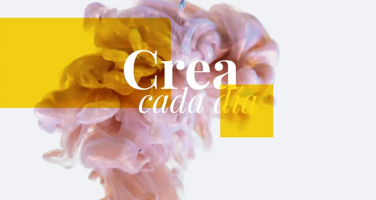 Nubes de tinta dorada y rosa se mezclan, con el texto "Crea cada día". Un ejemplo de trucos publicitarios para inspirar.