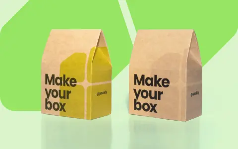 Dos cajas de cartón, una con diseño amarillo y la otra sin, ambas con el lema "Make your box".