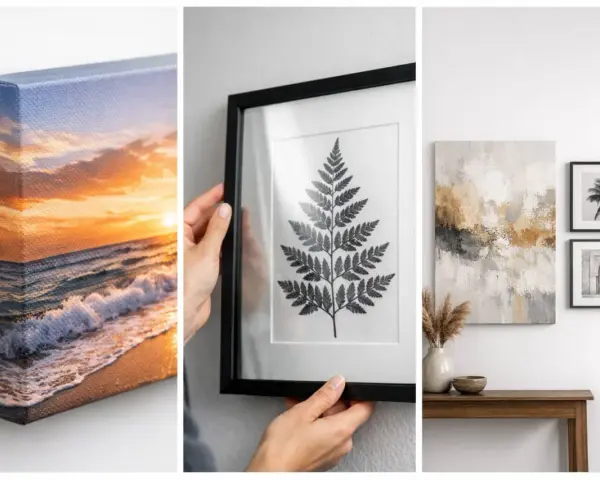 Un lienzo con un atardecer en la playa, una hoja de helecho enmarcada y arte abstracto sobre una mesa.